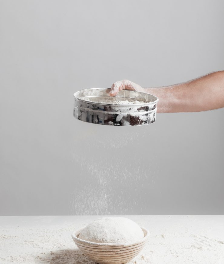 Sifting flour for baking